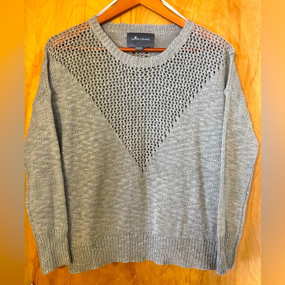 Paper crane women’s gray sweater with detailed neckline , size small.